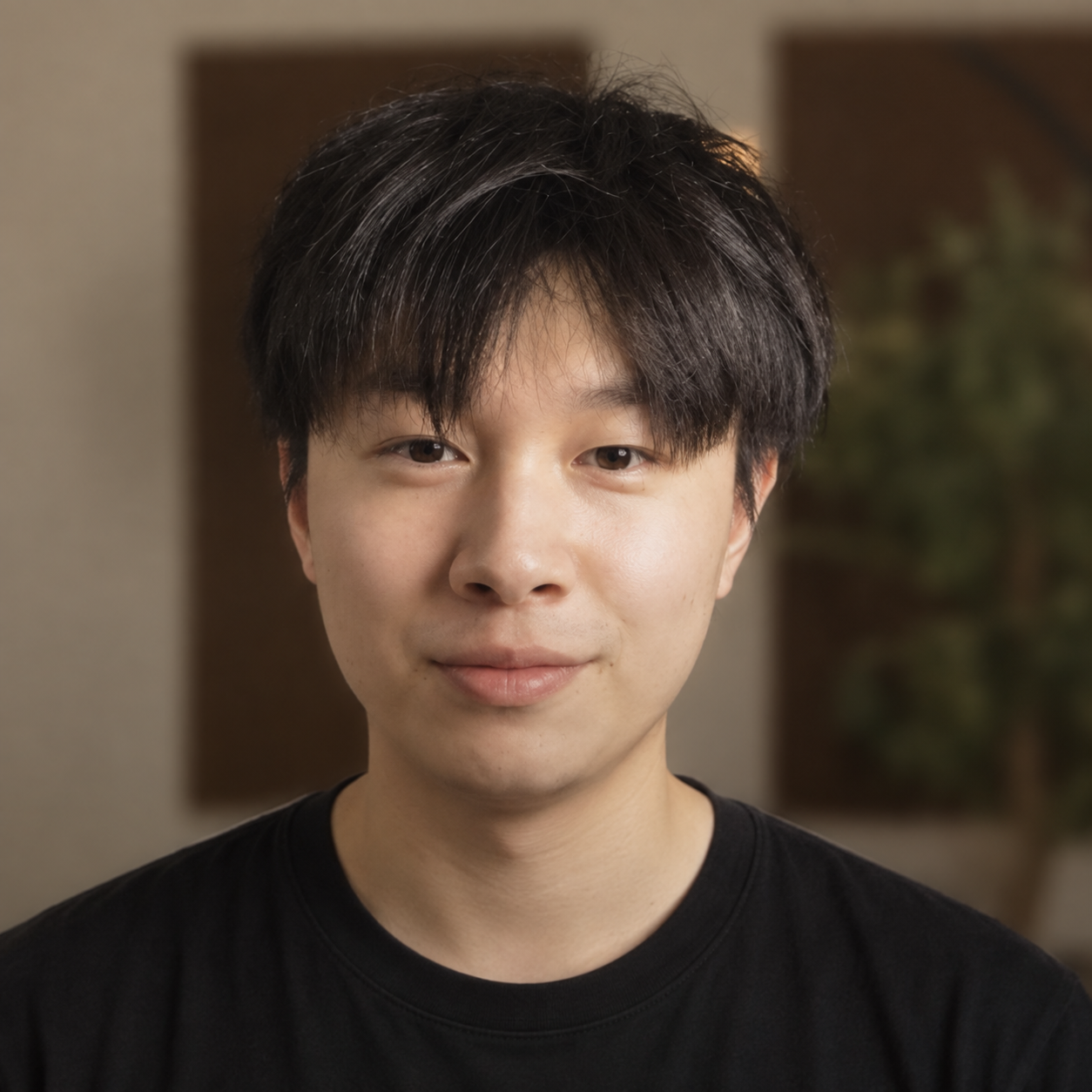 Alex Chen wearing a black shirt